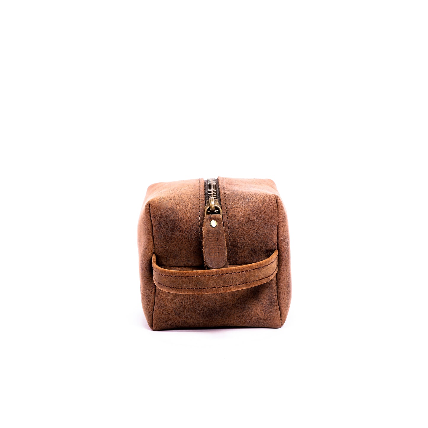 a smallest brown leather toiletry pouch with one big compartment with zipper for travel needs , travel pouch, vanity pouch, leather bag, Genuine leather bag, toiletry pouch.